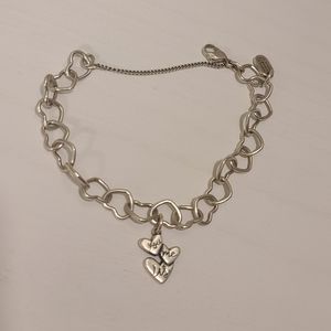 James Avery Connected Hearts Charm Bracelet with "you me us" charm.